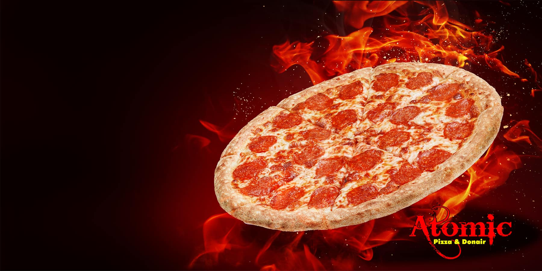 Pepperoni pizza over flames