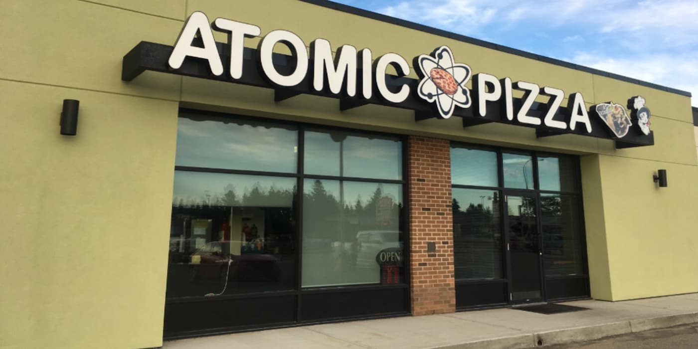 Atomic Pizza storefront on 48 Street